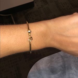 Gold Kate spade bracelet with bow